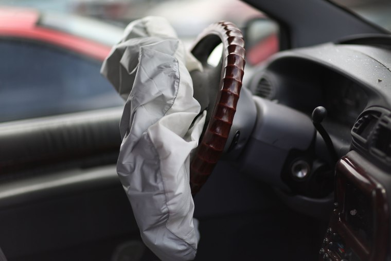 Image:  A deployed airbag is seen in a Chrysler vehicle