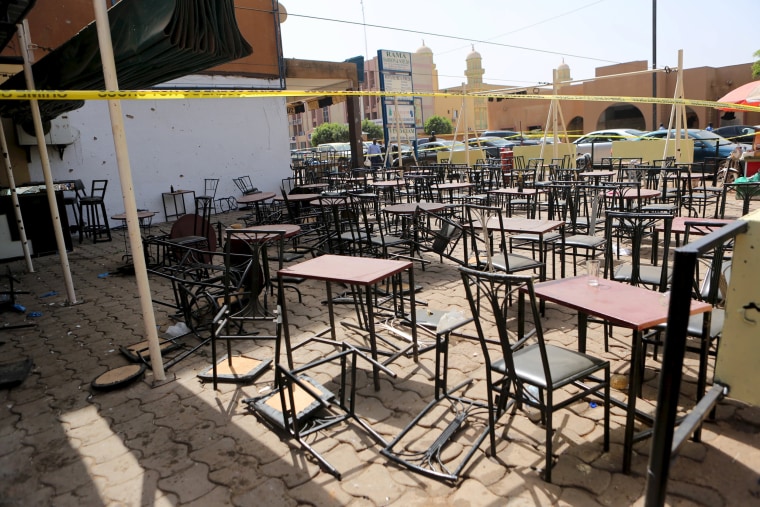 Image: The \"Taxi-Brousse\" restaurant, across the street from the Splendid Hotel (not pictured), is seen