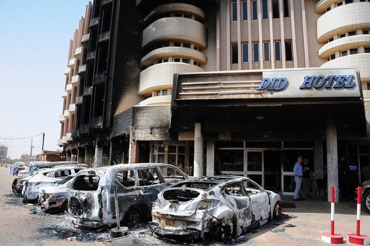 Image: Damaged cars parked out the hotel
