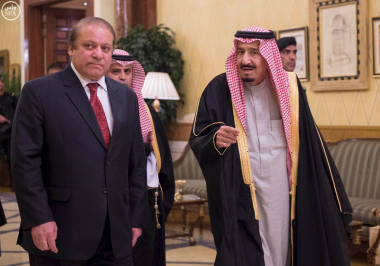 Image: Handout photo of Saudi King Salman welcoming Pakistani Prime Minister Nawaz Sharif in Riyadh