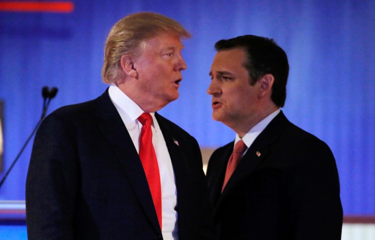 Image: Republican U.S. presidential candidate Trump and rival candidate Cruz cross paths during a break at the Fox Business Network Republican presidential candidates debate in North Charleston