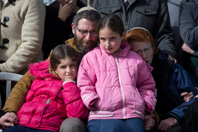 Image: Natan Meir and his children.