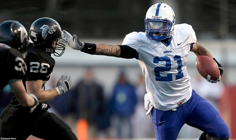 Harvey Langi runs the ball in a play dedicated to his family.