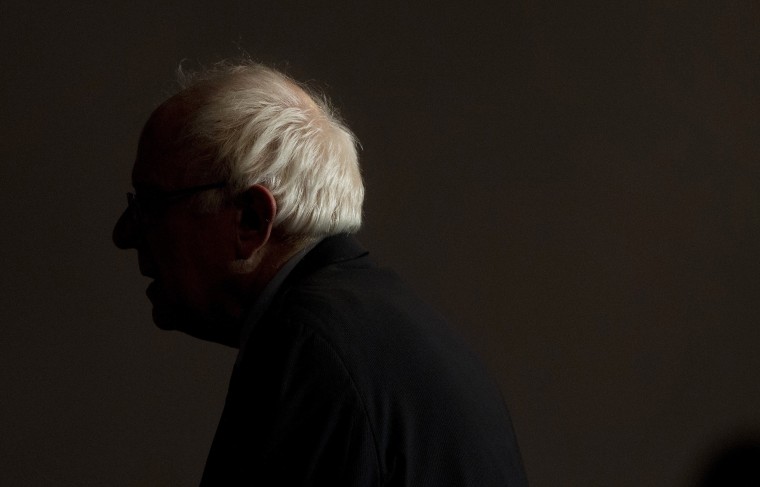 Image: Democratic presidential candidate Sen. Bernie Sanders leaves after speaking to a crowded room in Birmingham