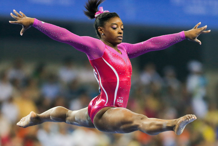 Image: Simone Biles operforms on the Balance Beam