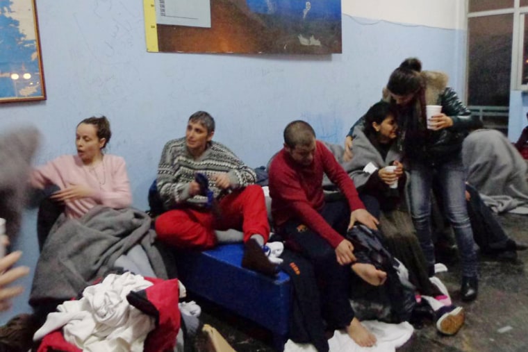 Image: Survivors on the island of Kalolimnos after Friday's rescue operation