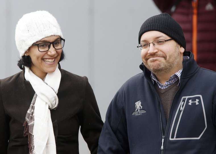 Image: U.S. journalist Jason Rezaian smiles next to his wife Yeganeh Salehi