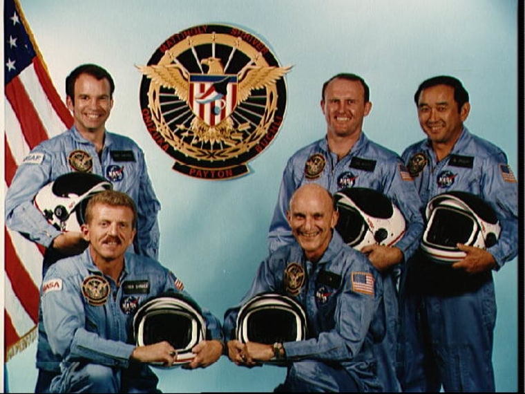 The crew of STS-51-C, the 15th space shuttle mission, flown in 1985. From left: payload specialist Gary E. Payton, pilot Loren J. Shriver, commander Thomas K. Mattingly II, and mission specialists James F. Buchli and Ellison S. Onizuka.