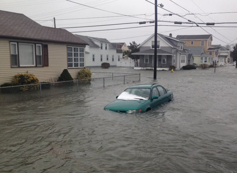 A car is submerged in floodwaters in North Wildwood, New Jersey, on Jan. 23.