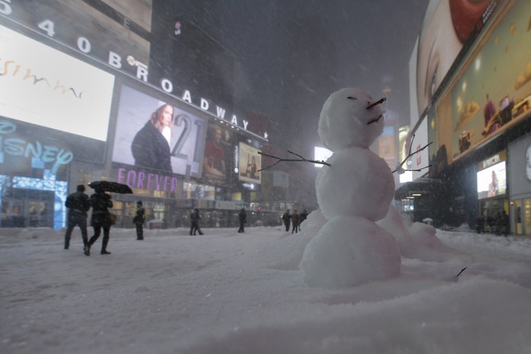 Image: A snowman is pictured in Times Square in the Manhattan borough of New York