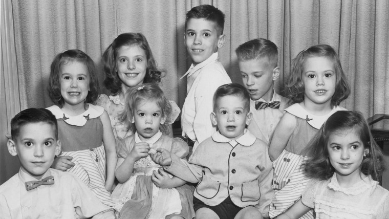 A photo of the nine Volk children, taken in 1963 when the youngest set of twins, Jim and Sandra, were three.
