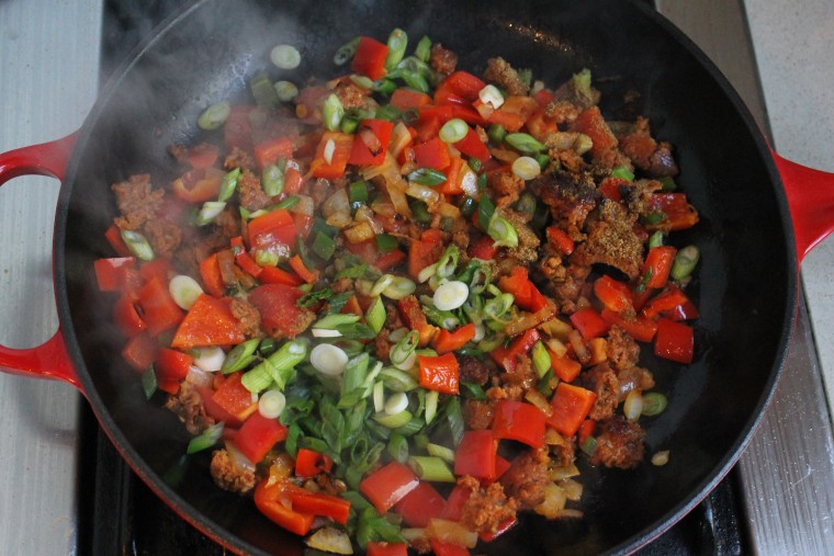 Slow Cooker Huevos Rancheros: Add the scallion, cumin and cayenne