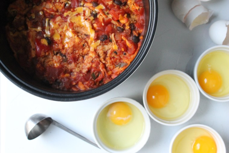 Slow Cooker Huevos Rancheros: After cooking for 3½ hours, crack the eggs into individual ramekins