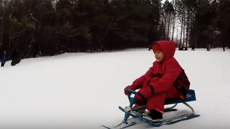 A local boy in Peterborough gave the Syrian children a gift of a stool racer they used to have fun sledding down Armour Hill in town.