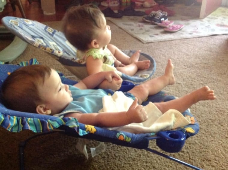 Mom's preemie twins held hands during infancy