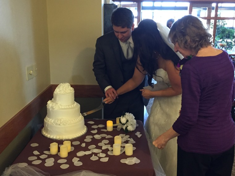 Julia, Justin, and Linda cut the cake