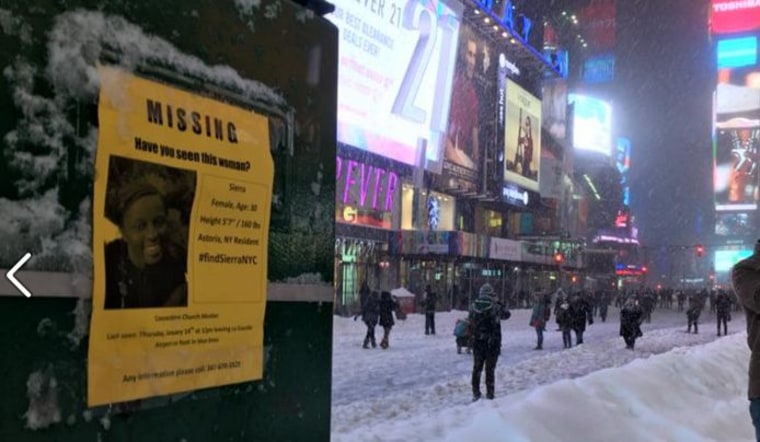 One of the missing person flyers hanging in Times Square, New York City.