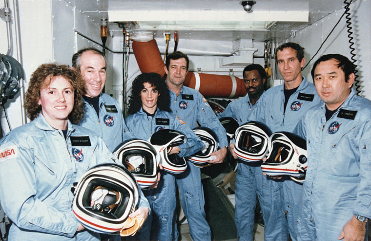 Image: Challenger's crew members stand in the White Room at Launch Pad 39B