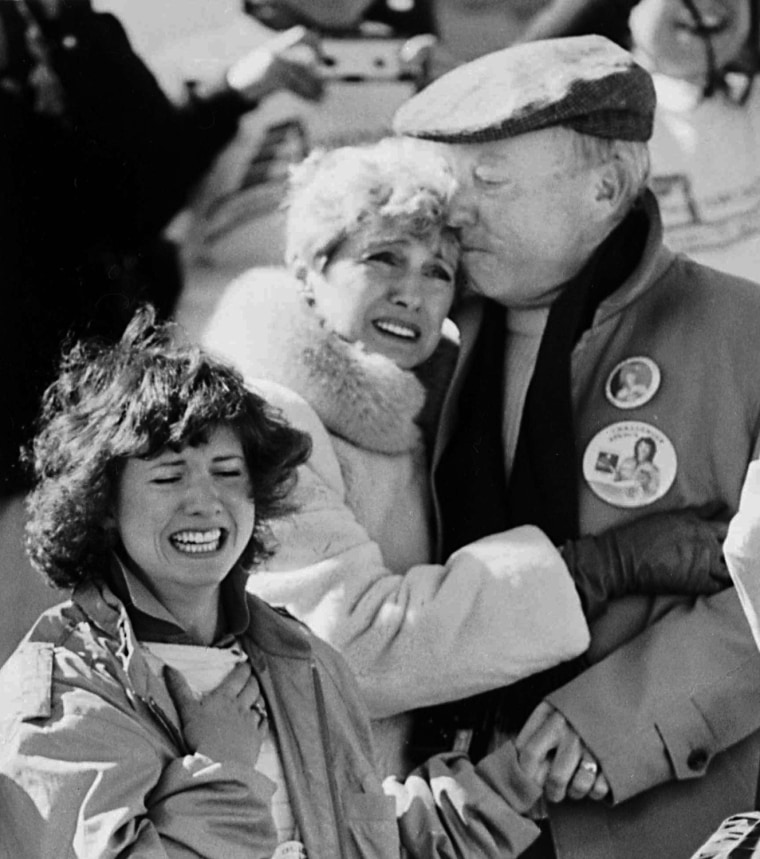 Image: Members of teacher-astronaut Christa McAuliffe's family react shortly after the failed liftoff