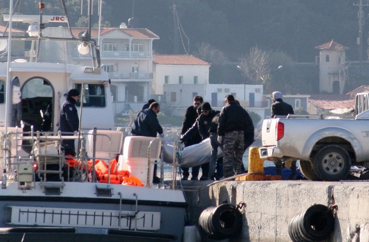 Image: A coast guard vessel arrives with the dead bodies of migrants on the eastern Greek island of Samos, Thursday.