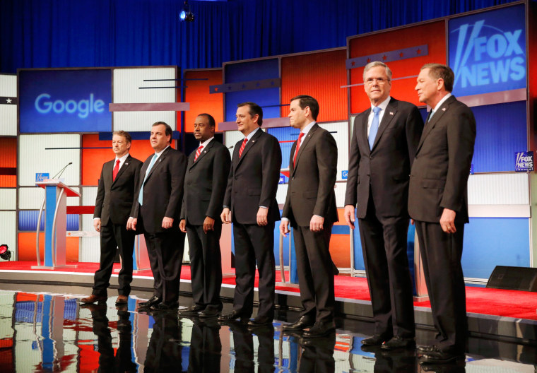 Image: Republican U.S. presidential candidates pose together onstage at the start of the debate held by Fox News for the top 2016 U.S. Republican presidential candidates in Des Moines