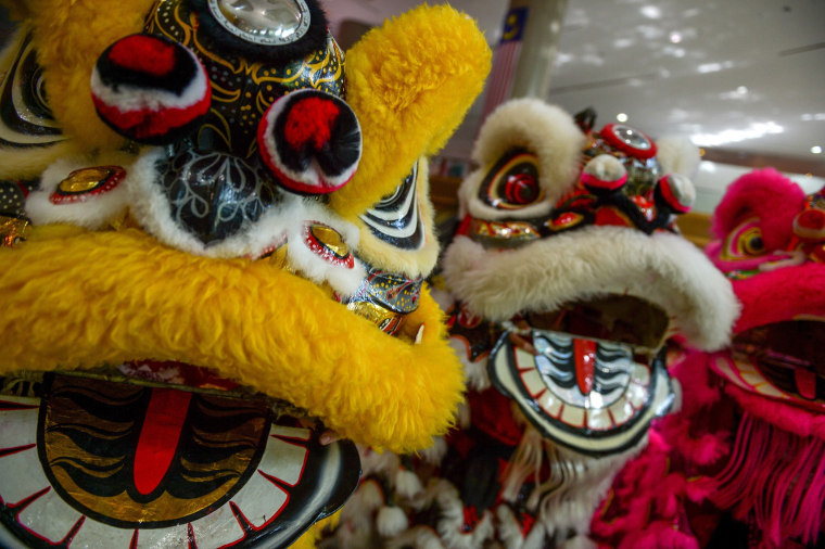 Image: Traditional lion dance performers at an event