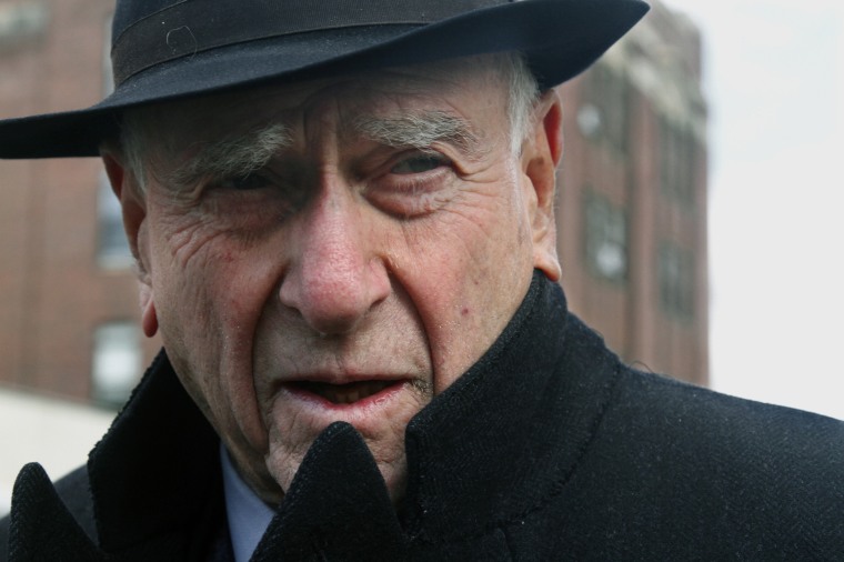 Image: Judge Jack Weinstein speaks with reporters after visiting the Louis Armstrong housing projects in Brooklyn in 2011.