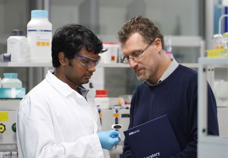 Image: Scientist Raffaele Mezzenga and a researcher in their lab at ETH Zurich university in Switzerland