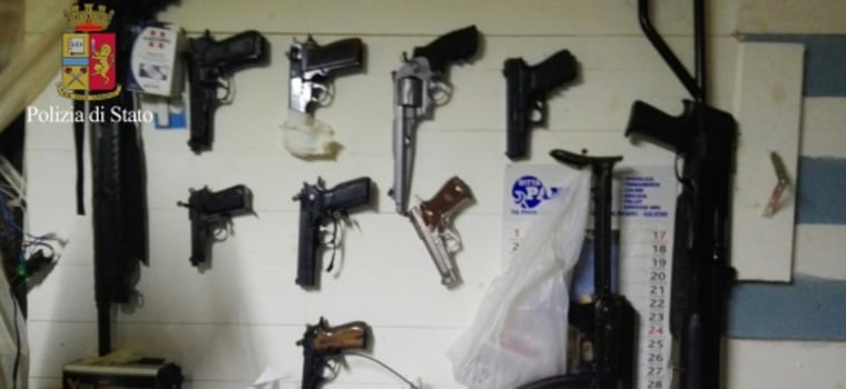 Image: Police show the weapons seized in the bunker where the fugitives were found.