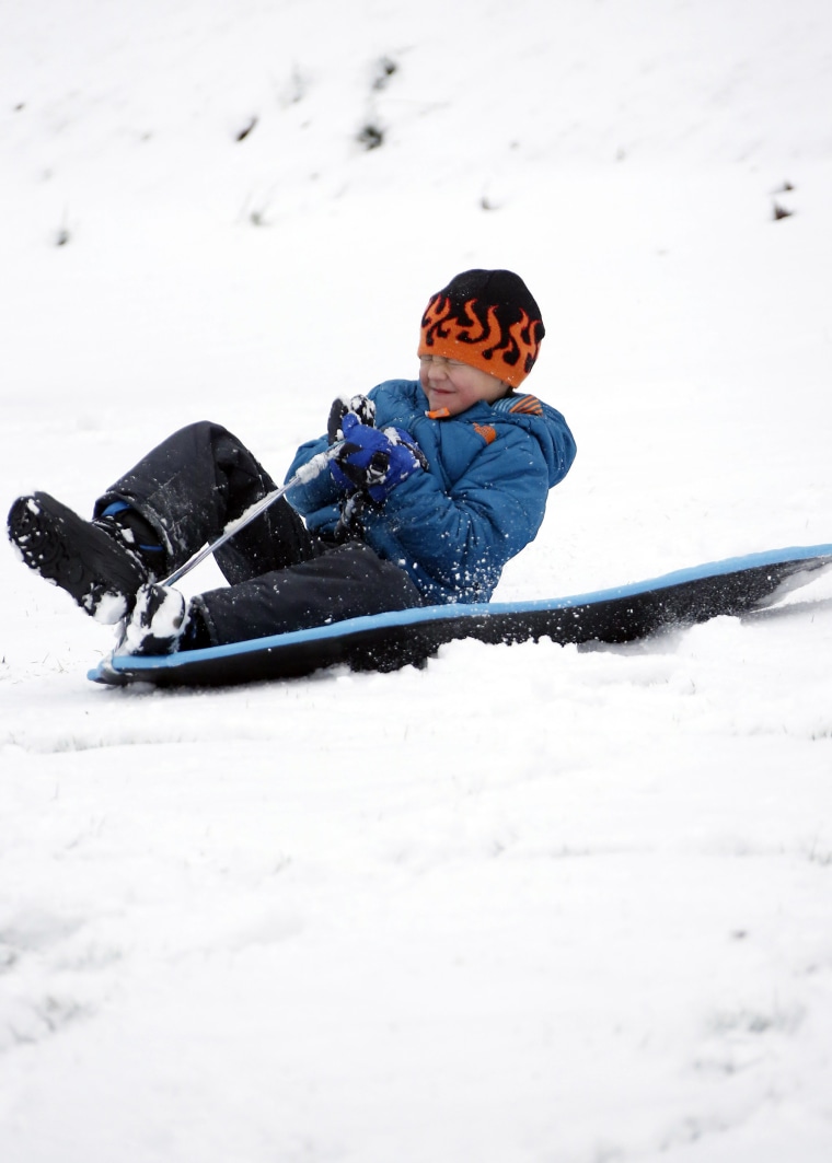 kid sledding