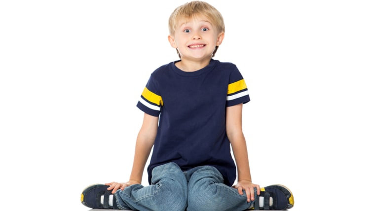 Boy sitting on floor