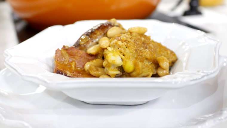 Chef Michael White cooks up a cassoulet, a French casserole, with bacon, beans and chicken