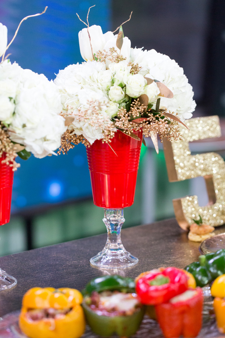 Home and food ideas for your Super Bowl party: red solo cup vase