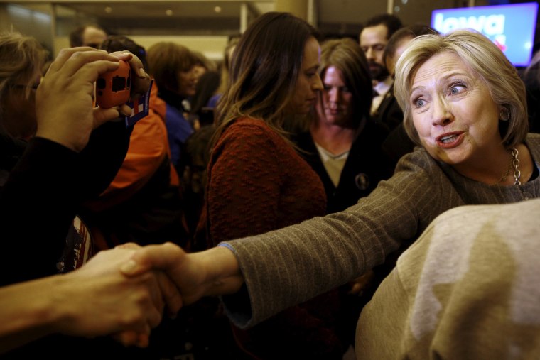 Image: Hillary Clinton shakes hands with supporters