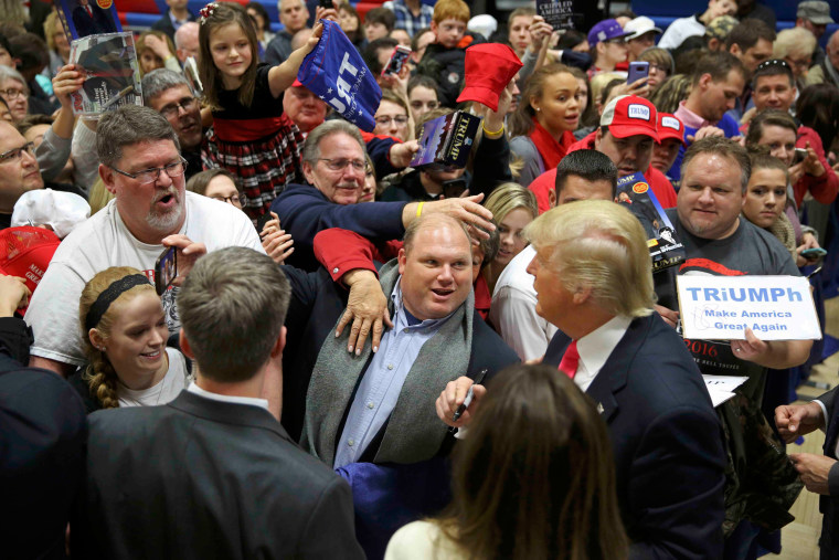 Image: Donald Trump is mobbed by supporters