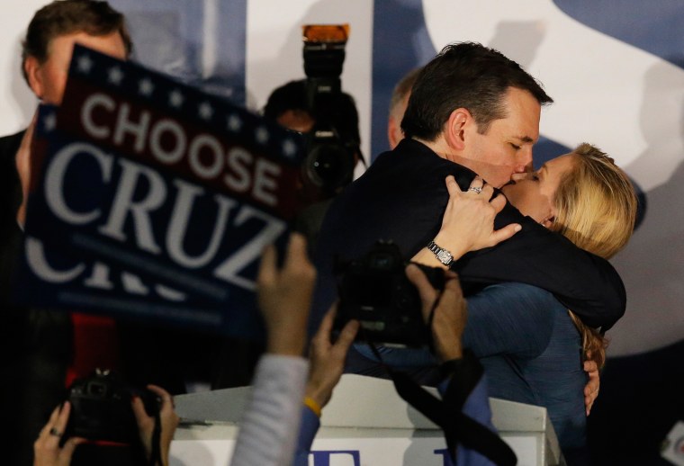 Image: U.S. Republican presidential candidate Ted Cruz kisses his wife Heidi Cruz after winning at his Iowa caucus night rally in Des Moines