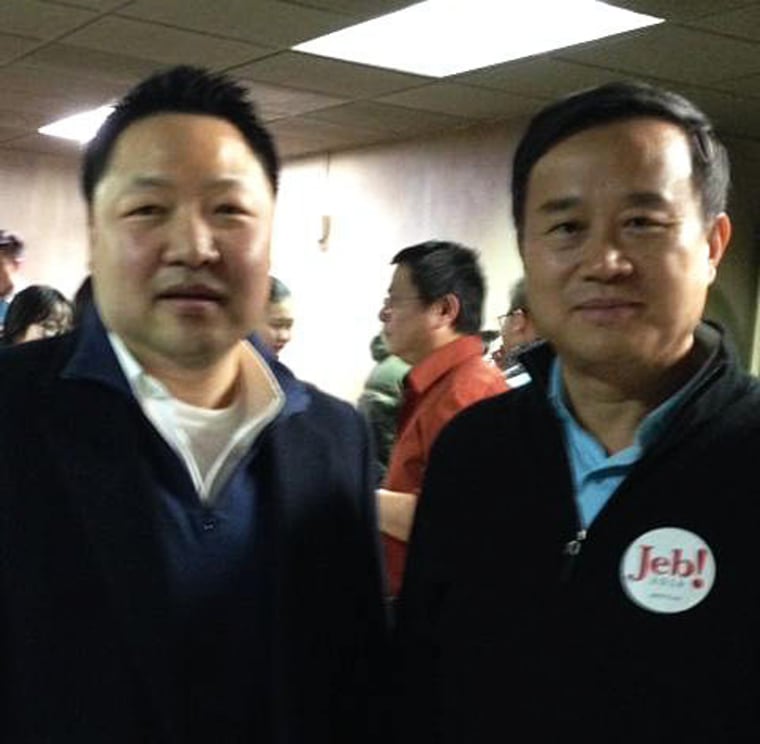 Ben Jung with a Jeb Bush supporter at the Asian-American Presidential Town Hall in Iowa, Friday, Jan. 29, 2016.