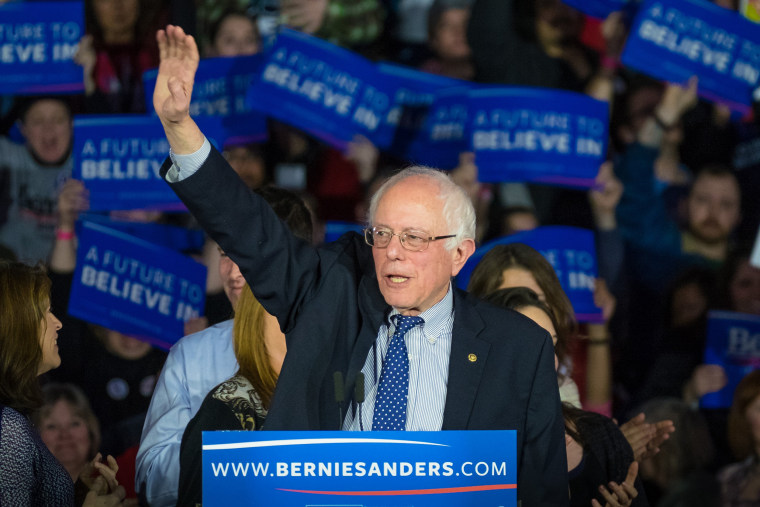 Image: Democratic presidential candidate, Sen. Bernie Sanders, I-Vt,  waves to the crowd