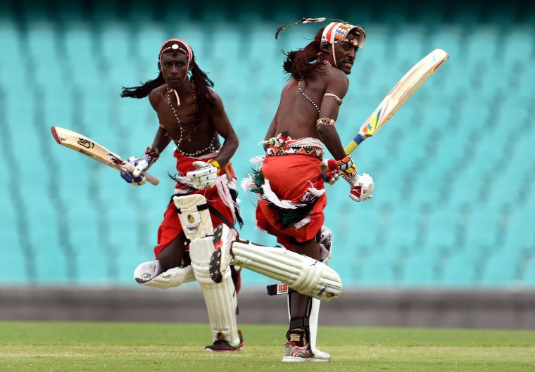Image: Maasai Warriors from Kenya take a run in a cricket match