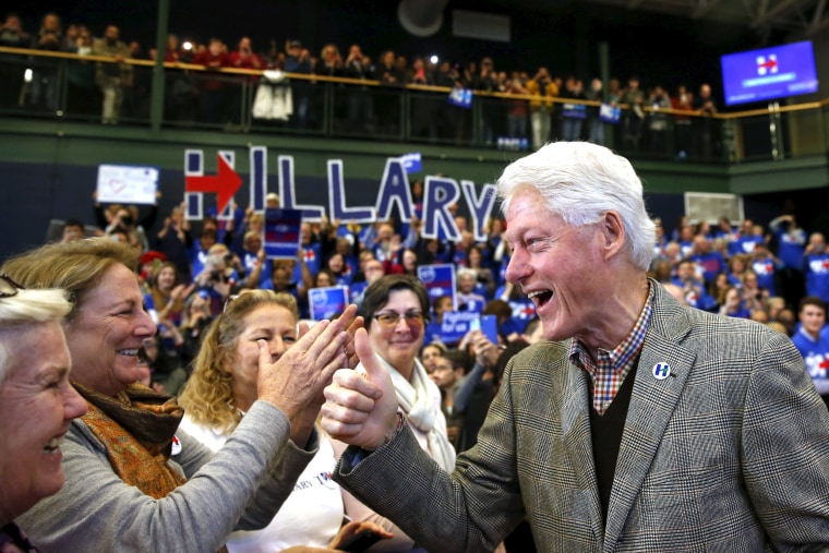 Image: Former U.S. President Bill Clinton gestures to supporters before introducing U.S. Democratic presidential candidate Hillary Clinton at a campaign rally at Nashua Community College, in Nashua, New Hampshire