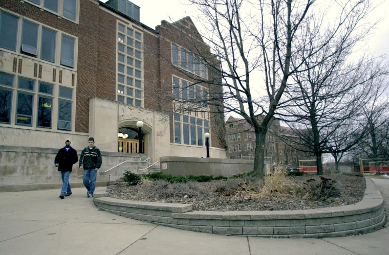 Image: Students leave the student union building on campus at Michigan State University