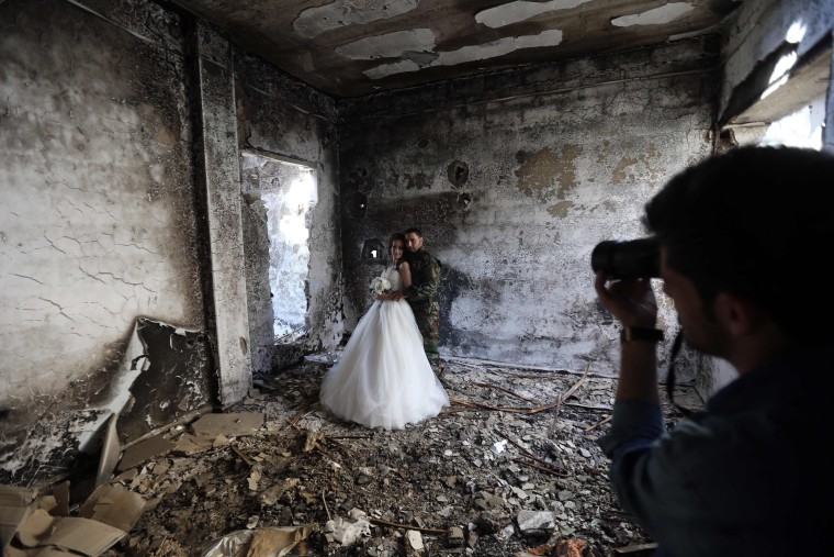 Image: TOPSHOT-SYRIA-CONFLICT-DAILY LIFE-WEDDING
