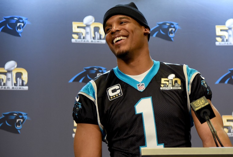 NO FILM, NO VIDEO, NO TV, NO DOCUMENTARY - Carolina Panthers quarterback Cam  Newton (1) walks off the field, as a fan takes a smiling selfie, following  a 24-10 loss to the