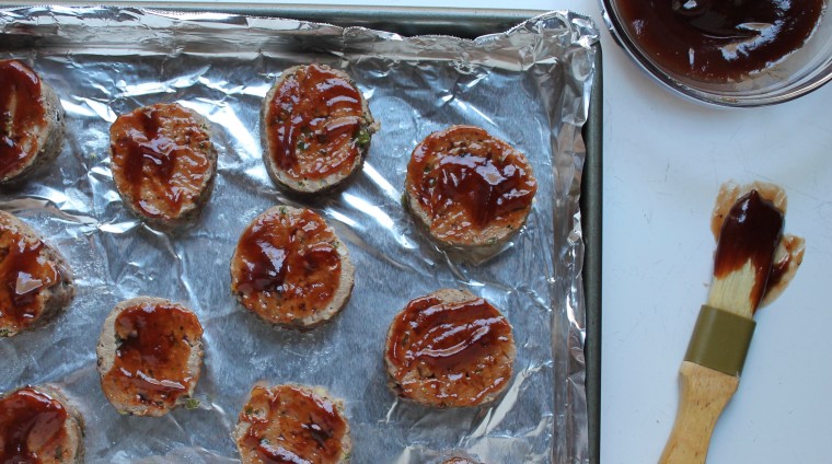 BBQ Mini Meat Loaf Sliders: Cut each log into 8 slices, arrange them on a baking sheet, brush the tops with the barbecue sauce and broil