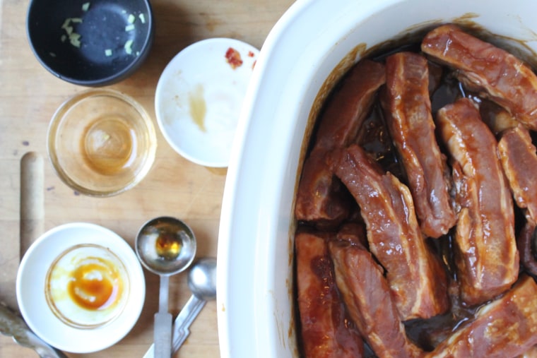 Slow Cooker Chinese Spareribs: Pour the pureed sauce over the meat and toss together