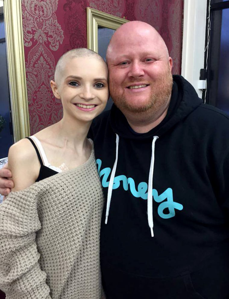 Emma with stepdad Mike, the 'rock' of the family.