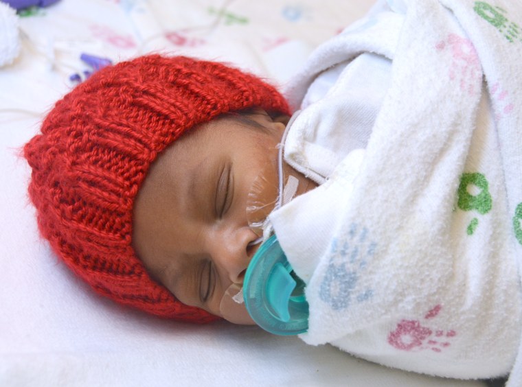 Many babies born in February are receiving red caps as part of the “Little Hats, Big Hearts” project, which draws attention to heart disease.