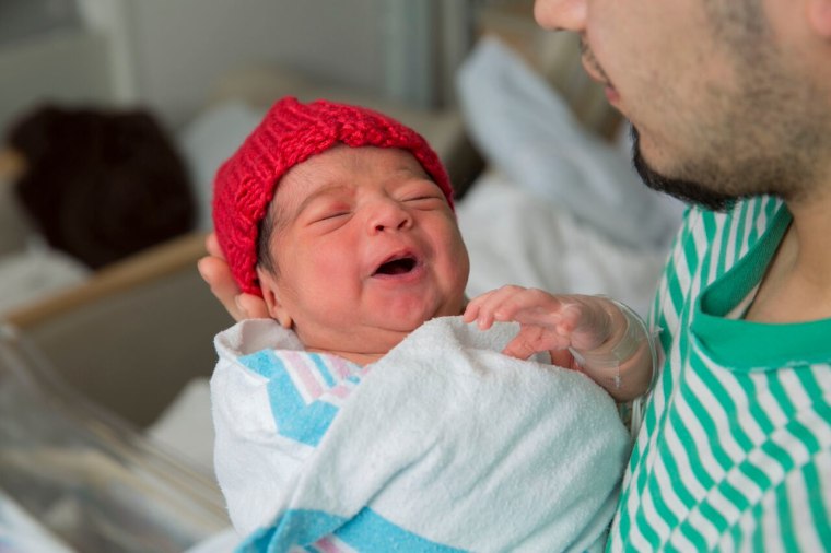 Many babies born in February are receiving red caps as part of the “Little Hats, Big Hearts” project, which draws attention to heart disease.