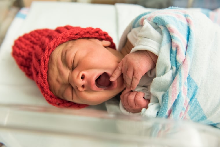 Many babies born in February are receiving red caps as part of the “Little Hats, Big Hearts” project, which draws attention to heart disease.