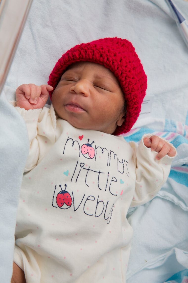 Many babies born in February are receiving red caps as part of the “Little Hats, Big Hearts” project, which draws attention to heart disease.